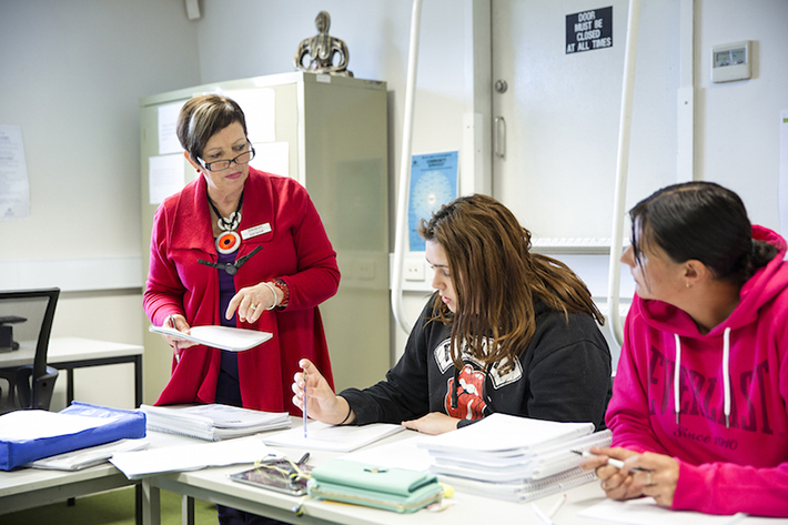 teacher in pink jacket